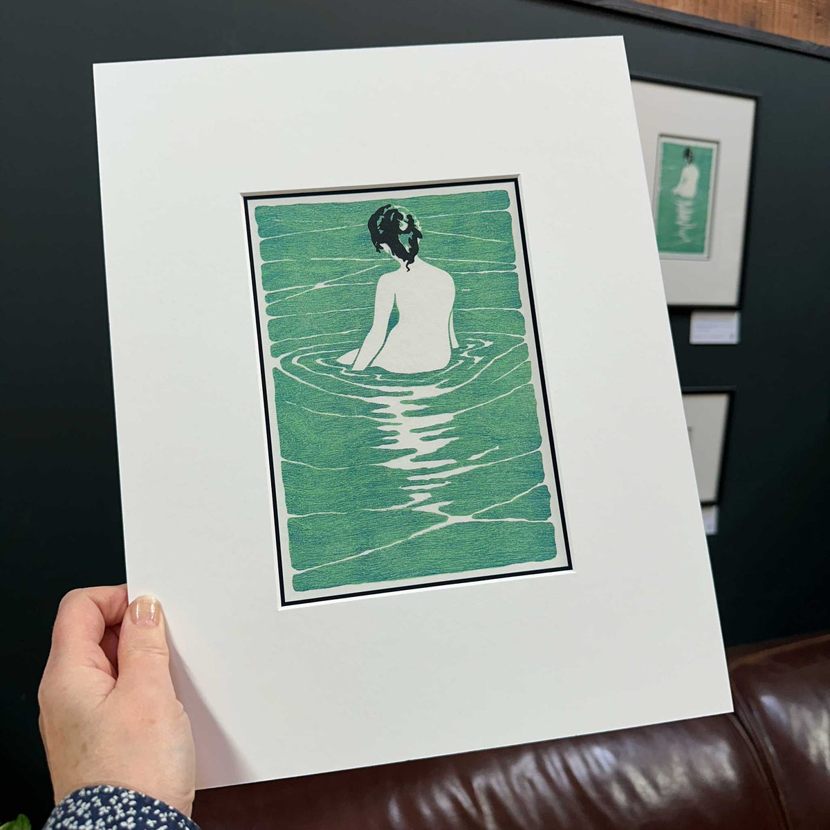 At The Hot Spring, after Ichijō Narumi. Japanese inspired fine art print of woman seated in water. 11" x 14" mounted print held in hand.