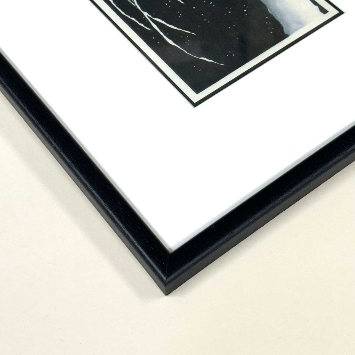 Egret on a Snow-Covered Branch, after Koson. Fine art print of a white egret perched on a snowy branch. Framed in black wood version detail.