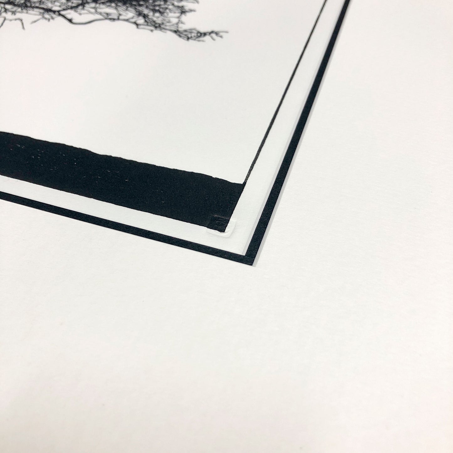 Embossed chop seal detail on original woodblock print.