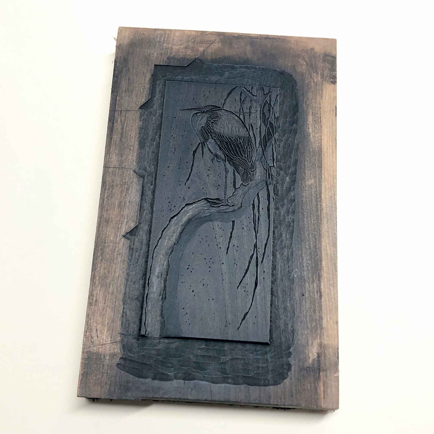 Hand-carved cherry woodblock used to print Egret on a Snow-Covered Branch, after Koson — part of Claire Cameron-Smith’s woodblock printing process.
