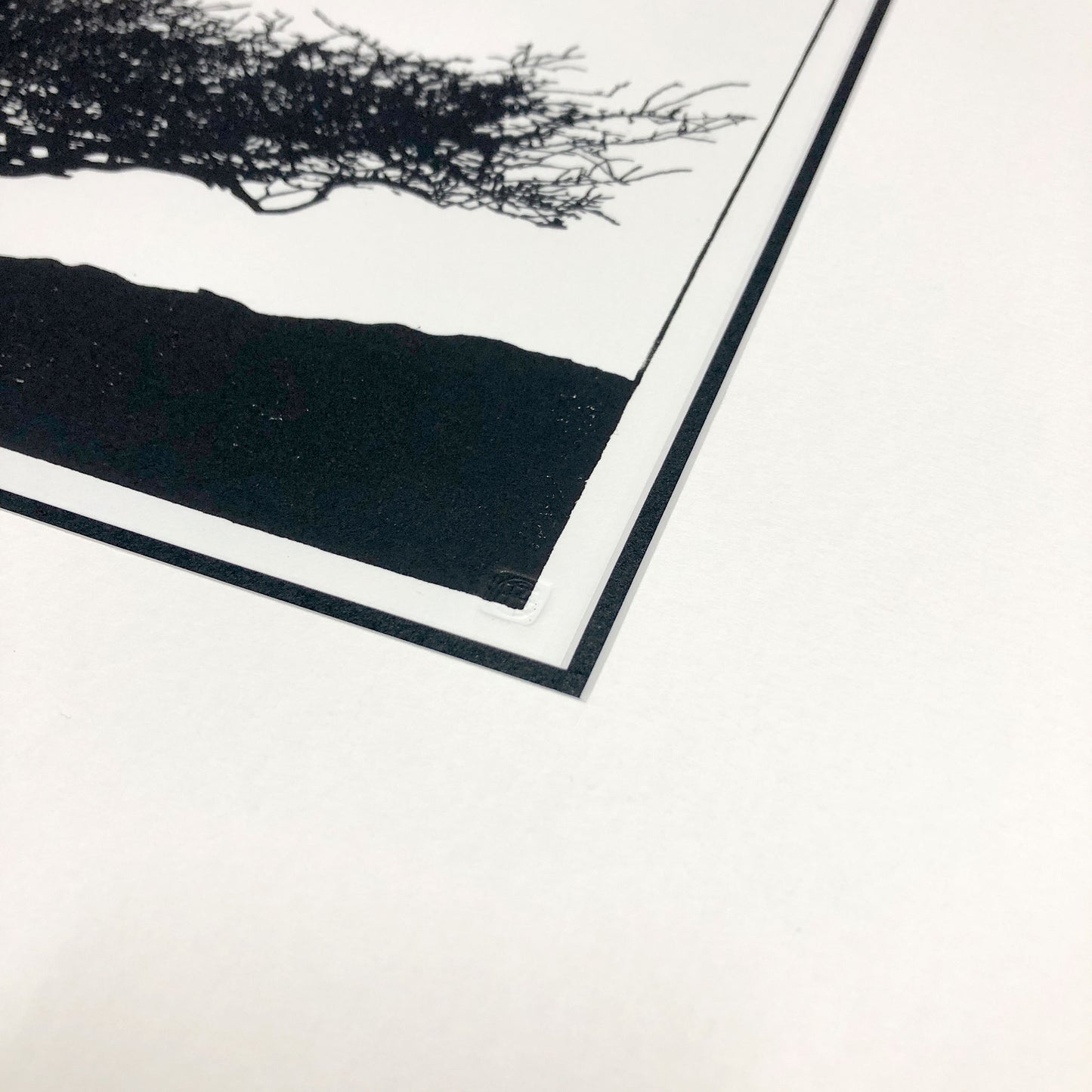 Embossed chop seal detail on original woodblock print.