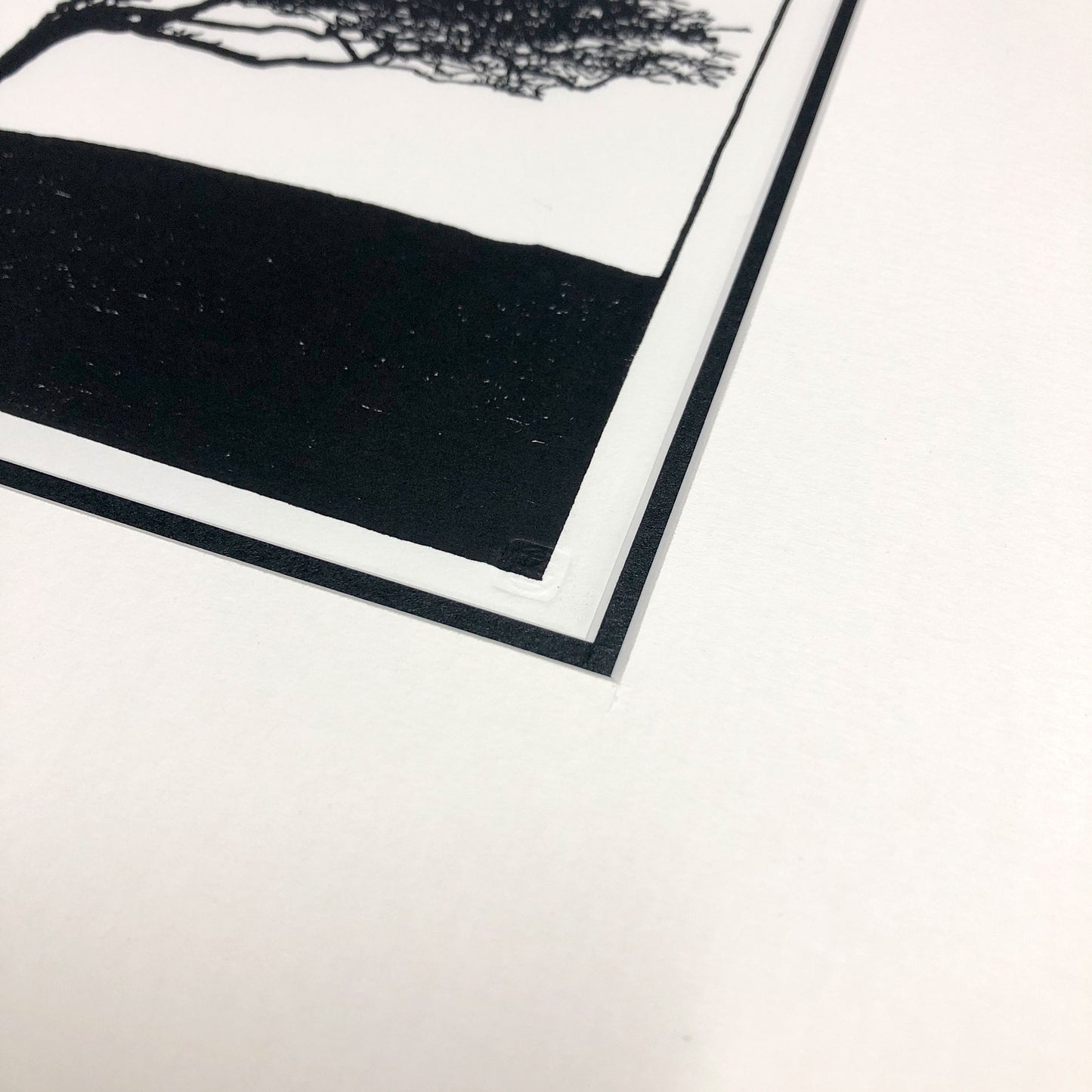 Embossed chop seal detail on original woodblock print.